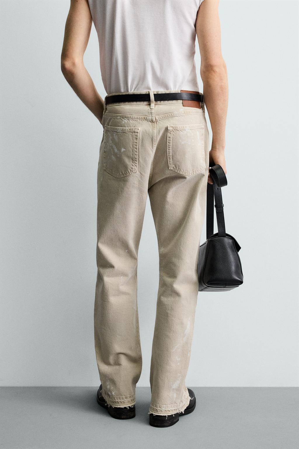 ДЖИНСЫ FLARE FIT С ЭФФЕКТОМ БРЫЗГ