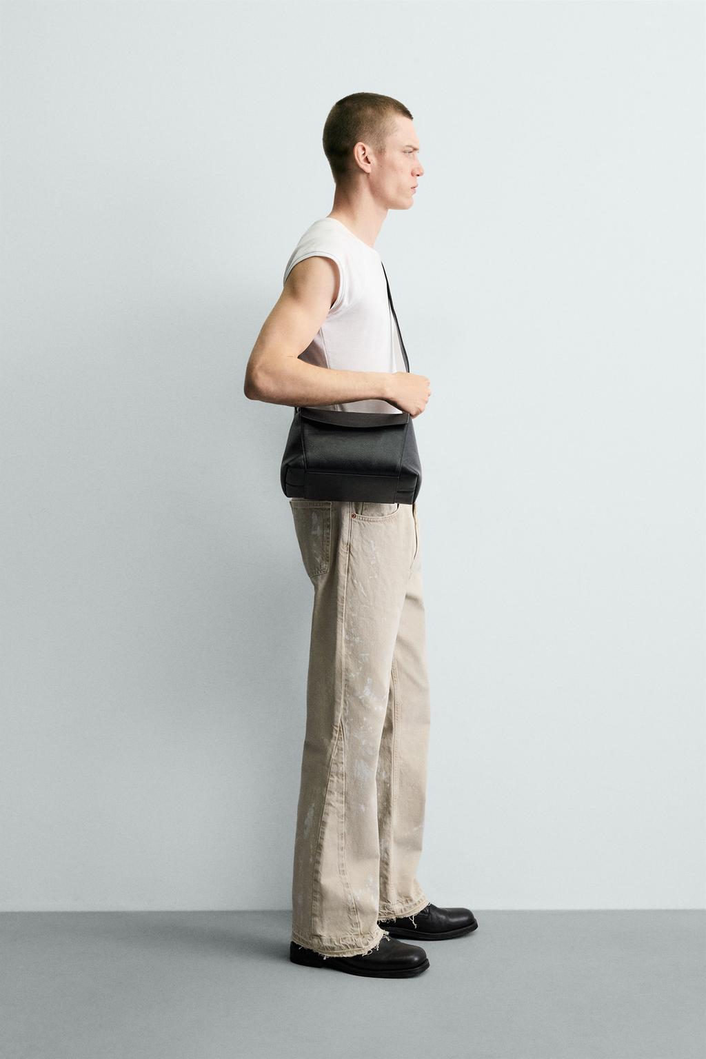 ДЖИНСЫ FLARE FIT С ЭФФЕКТОМ БРЫЗГ