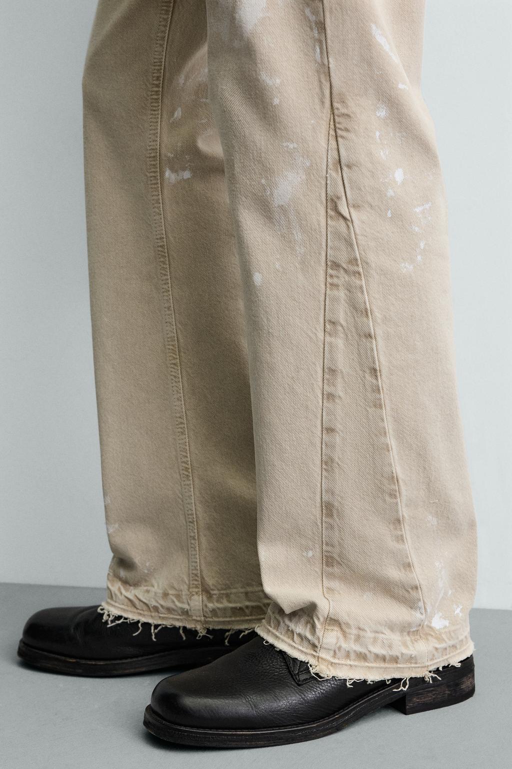 ДЖИНСЫ FLARE FIT С ЭФФЕКТОМ БРЫЗГ