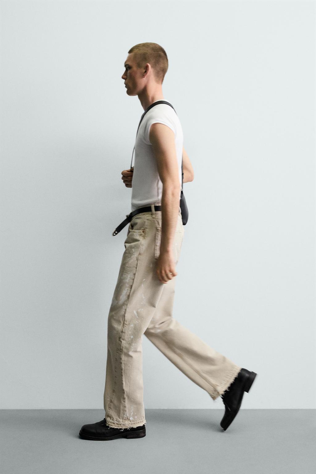 ДЖИНСЫ FLARE FIT С ЭФФЕКТОМ БРЫЗГ