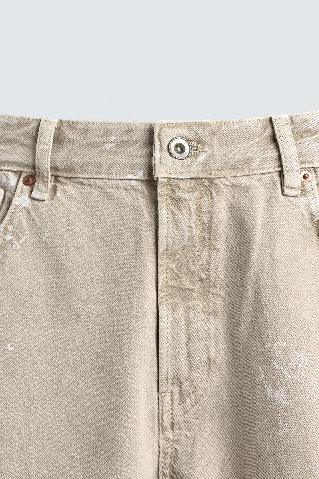 ДЖИНСЫ FLARE FIT С ЭФФЕКТОМ БРЫЗГ