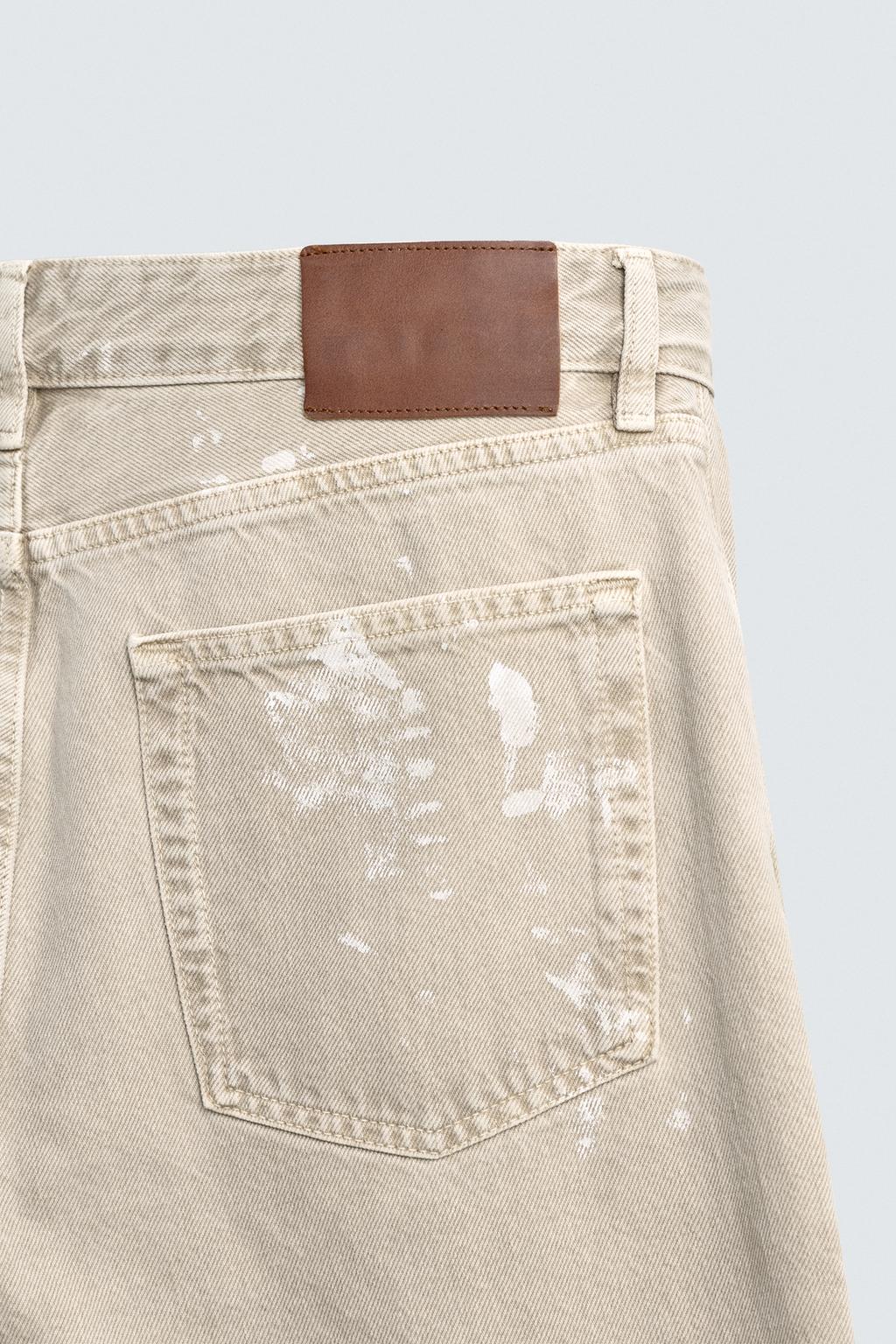 ДЖИНСЫ FLARE FIT С ЭФФЕКТОМ БРЫЗГ