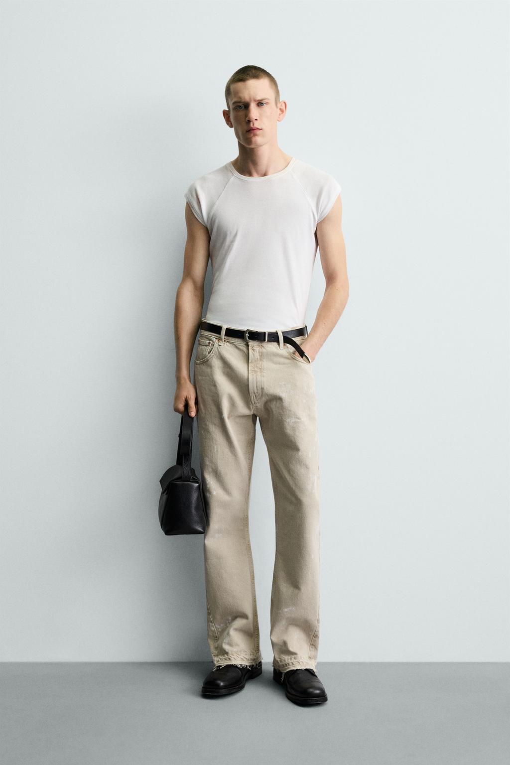 ДЖИНСЫ FLARE FIT С ЭФФЕКТОМ БРЫЗГ