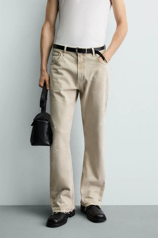 Джинсы Flare Fit с эффектом брызг- Заказать в России