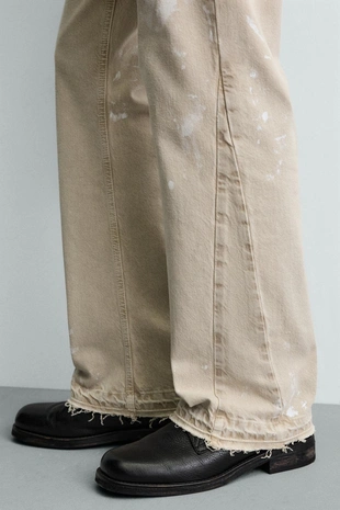 Джинсы Flare Fit с эффектом брызг- Заказать в России