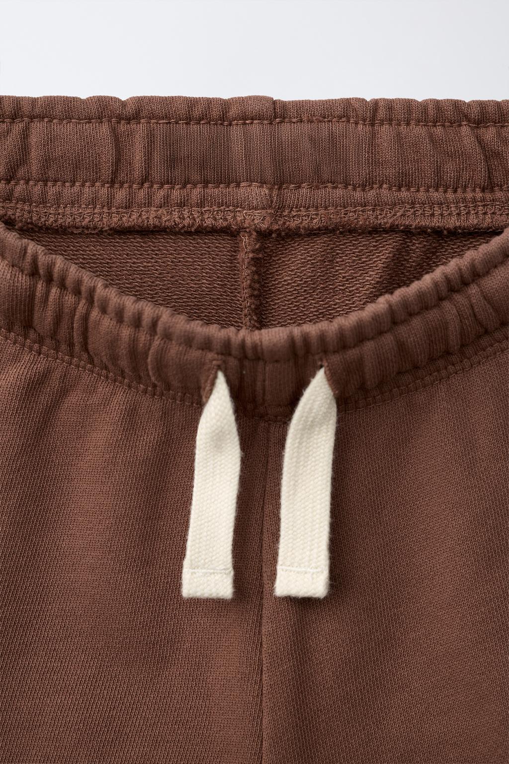 ШОРТЫ ИЗ МЯГКОЙ ТКАНИ С НАДПИСЬЮ