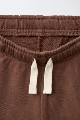 Шорты из мягкой ткани с надписью- Заказать в России