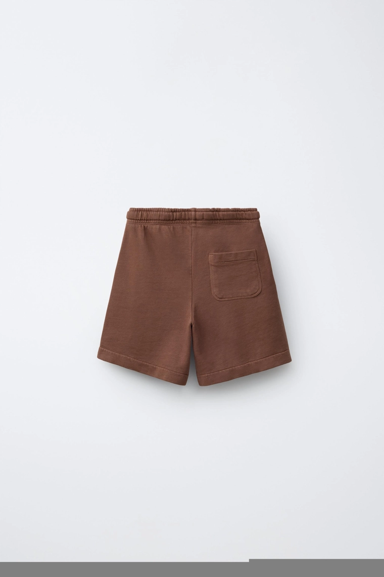 Плюшевые бермуды с текстовым принтом