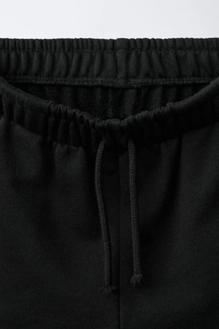 Шорты из мягкой ткани с нашивкой «звезда»- Заказать в России