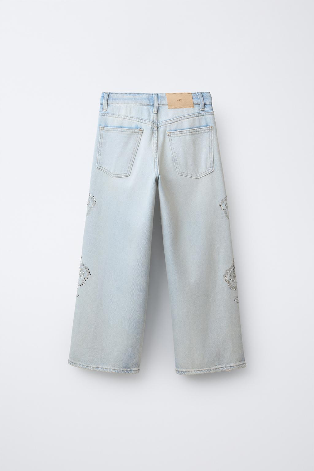 ДЖИНСЫ WIDE LEG С ЦВЕТОЧНЫМ ПРИНТОМ И СТРАЗАМИ