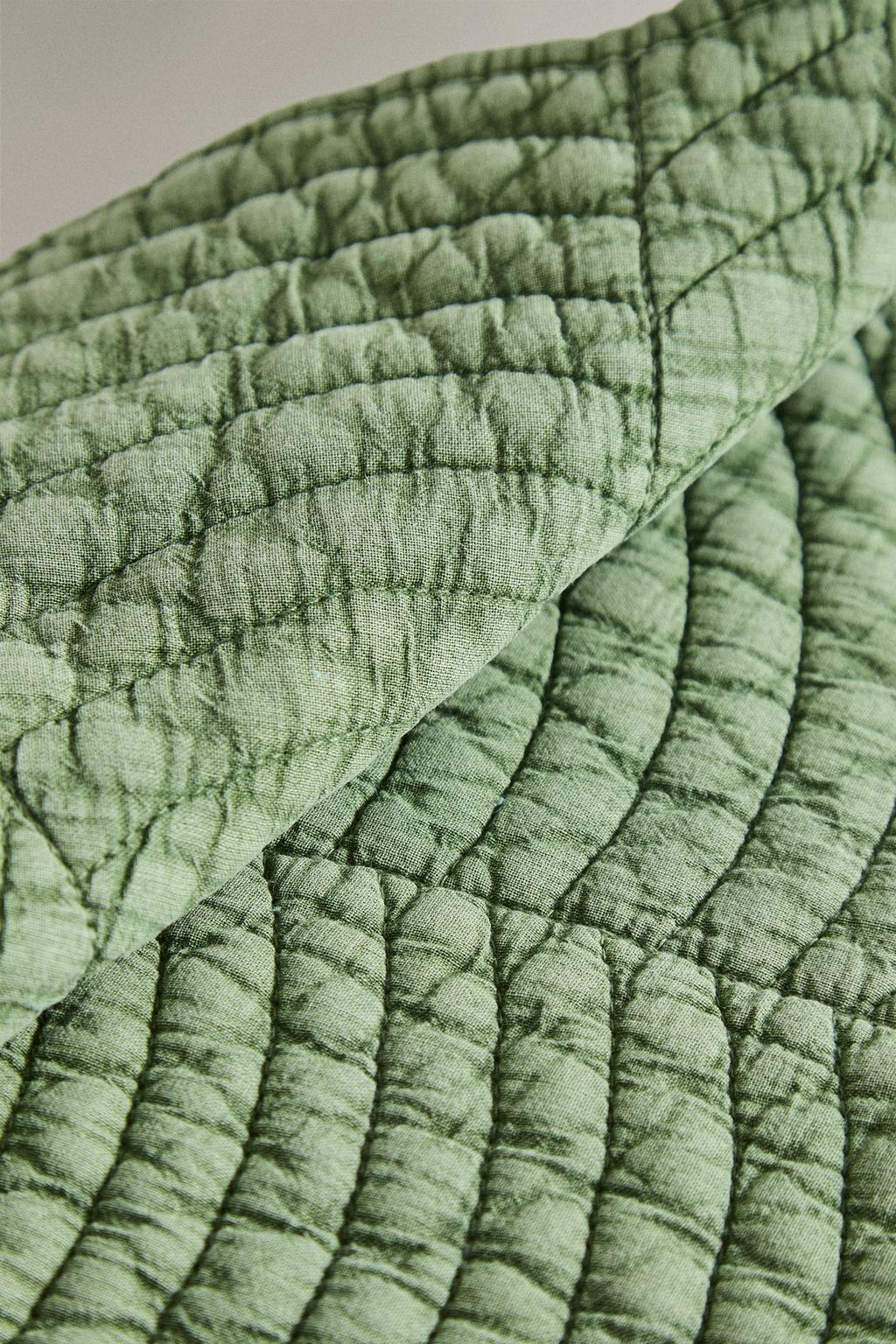 Стежаный подстаканник в форме клевера