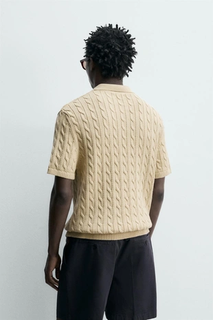Поло из рельефного трикотажа с косами- Заказать в России