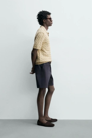 Поло из рельефного трикотажа с косами- Заказать в России