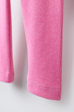 Леггинсы в рубчик с этикеткой