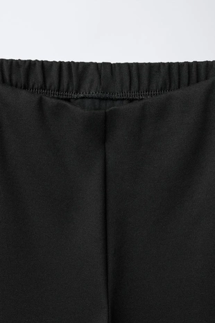 Широкие брюки из понта ди рома с цветком- Заказать в России