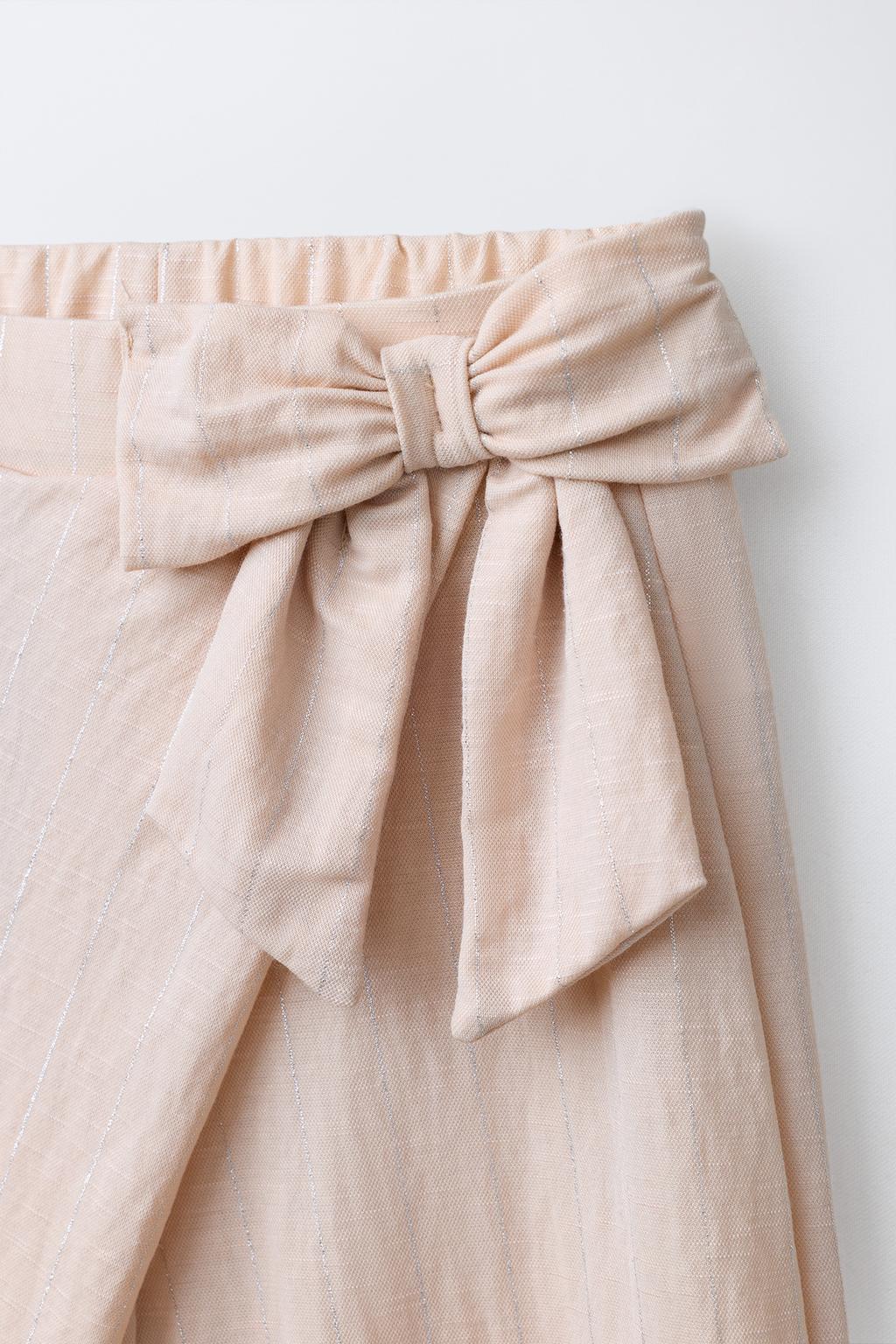 ШИРОКИЕ БРЮКИ В ПОЛОСКУ С БЛЕСТКАМИ И БАНТОМ