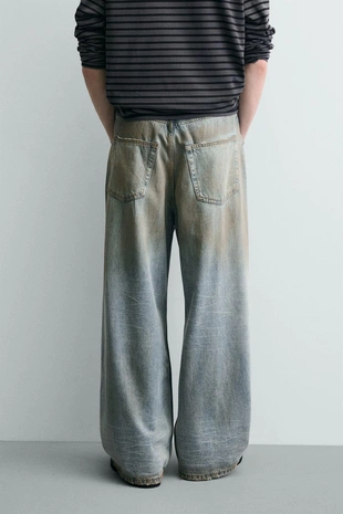 Джинсы Baggy Fit с эффектом винтажной потертости- Заказать в России