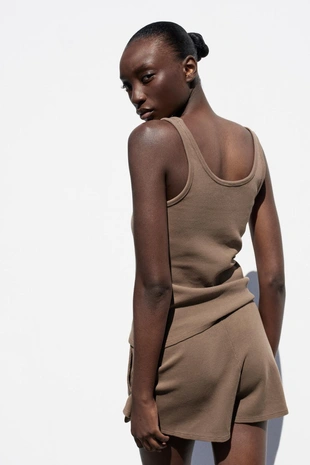 Шорты с эффектом потертости- Заказать в России