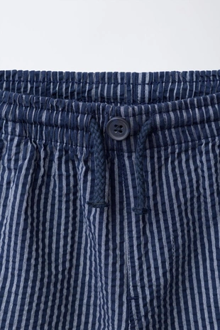 Брюки Seersucker в полоску- Заказать в России