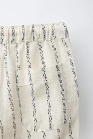 Брюки струящегося кроя из смесового льна- Заказать в России