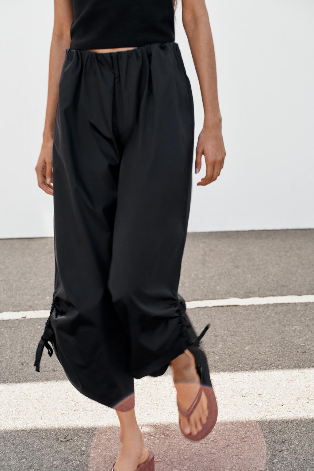 БРЮКИ-КЮЛОТЫ С РЕГУЛИРУЕМЫМИ МАНЖЕТАМИ