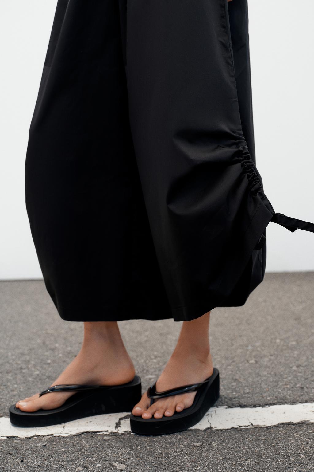 БРЮКИ-КЮЛОТЫ С РЕГУЛИРУЕМЫМИ МАНЖЕТАМИ