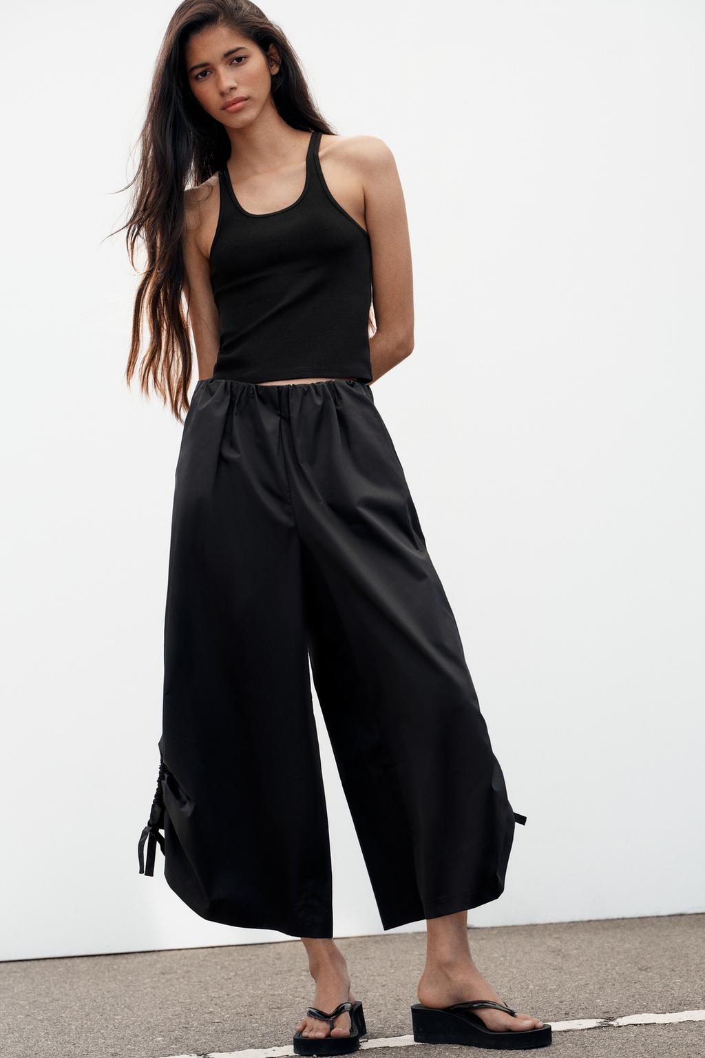 БРЮКИ-КЮЛОТЫ С РЕГУЛИРУЕМЫМИ МАНЖЕТАМИ