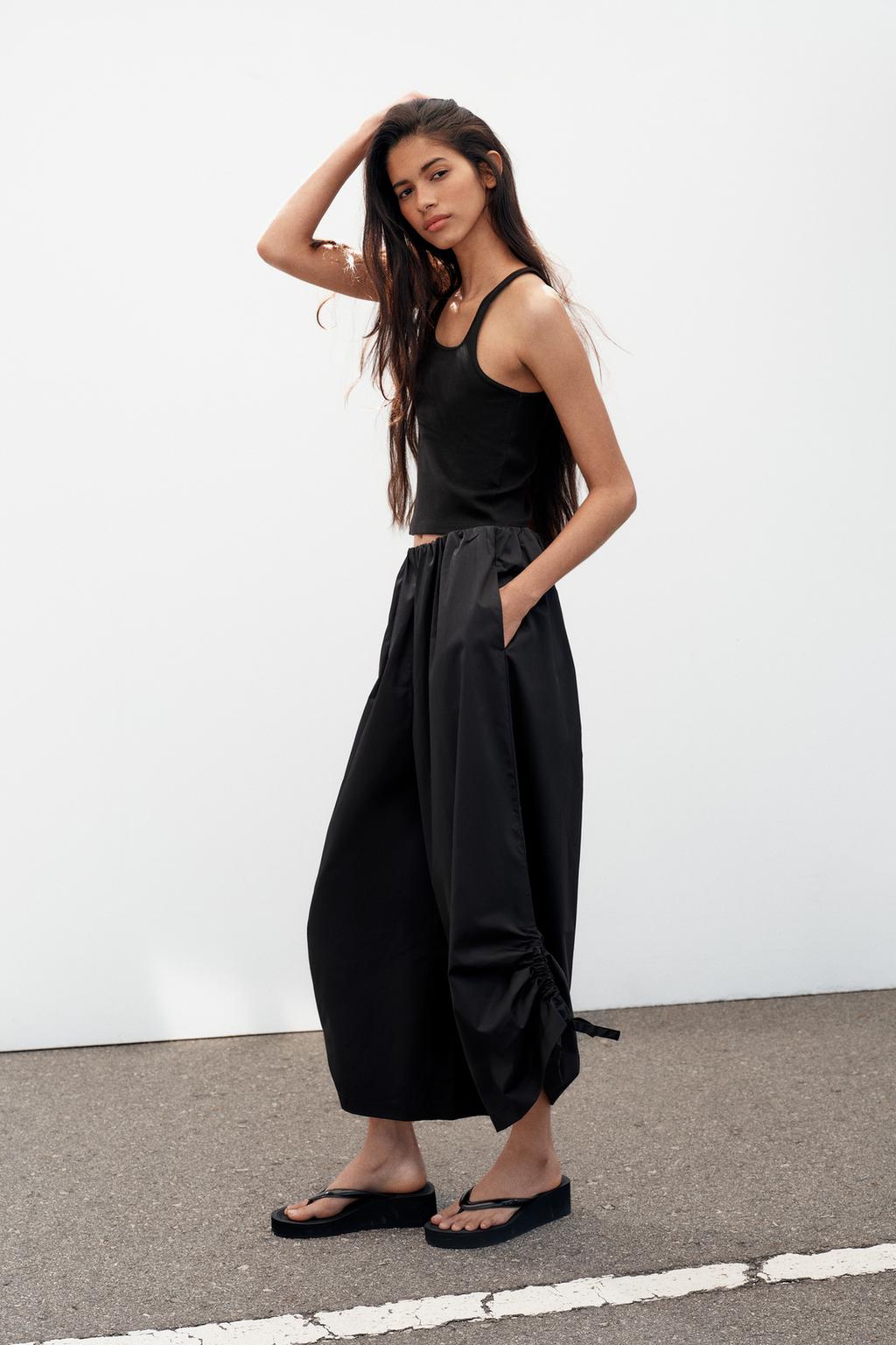 БРЮКИ-КЮЛОТЫ С РЕГУЛИРУЕМЫМИ МАНЖЕТАМИ