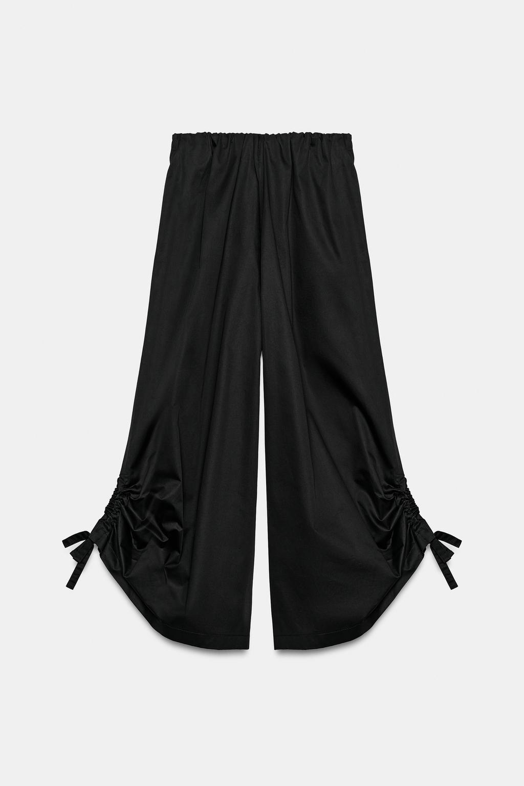 БРЮКИ-КЮЛОТЫ С РЕГУЛИРУЕМЫМИ МАНЖЕТАМИ