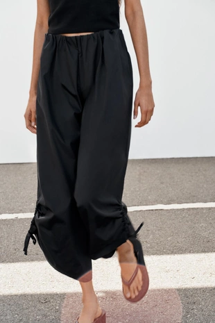 Брюки-кюлоты с регулируемыми манжетами- Заказать в России