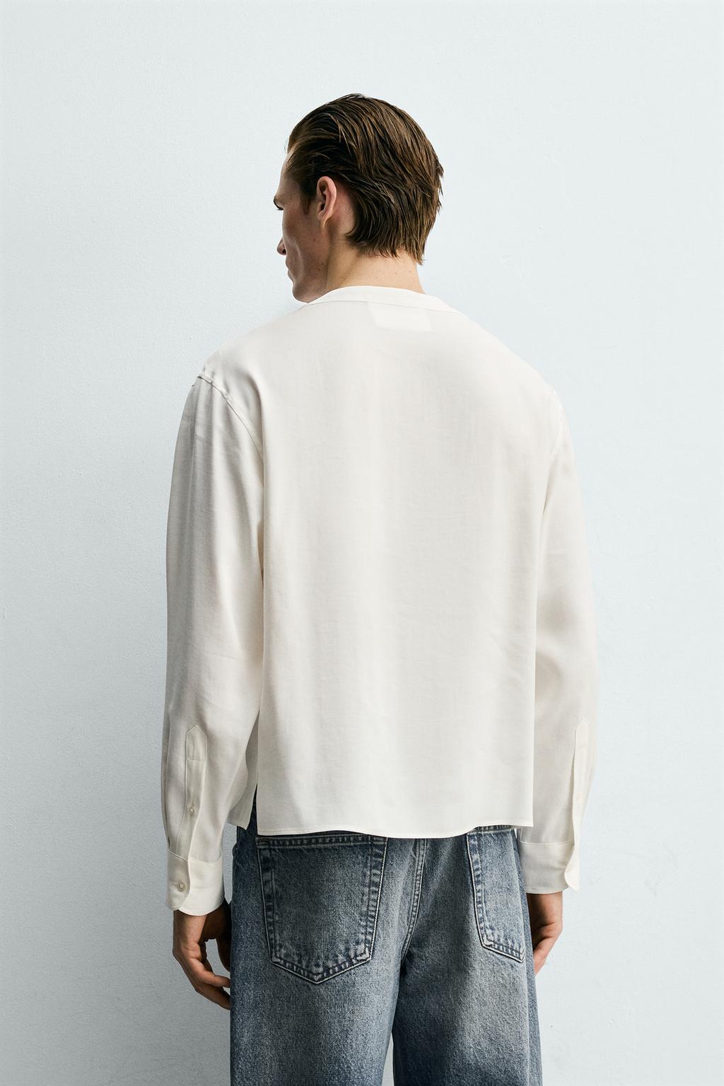 РУБАШКА С V-ОБРАЗНЫМ ВЫРЕЗОМ ИЗ СТРУЯЩЕЙСЯ ТКАНИ