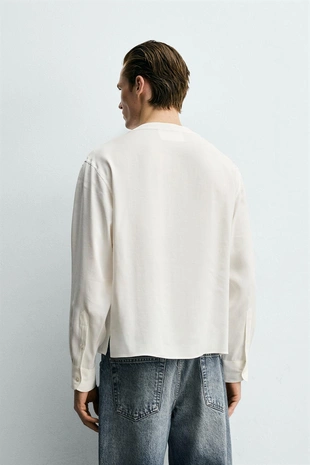 Рубашка с V-образным вырезом из струящейся ткани- Заказать в России