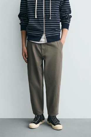 Брюки Carrot Fit с эффектом потертости