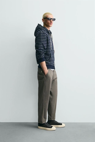 Брюки Carrot Fit с эффектом потертости