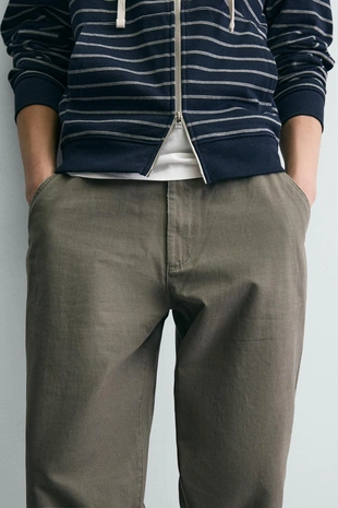 Брюки Carrot Fit с эффектом потертости- Заказать в России