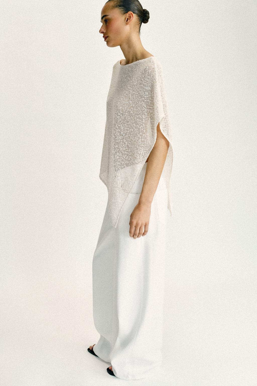 НАКИДКА АСИММЕТРИЧНОГО КРОЯ С БЛЕСТЯЩЕЙ НИТЬЮ