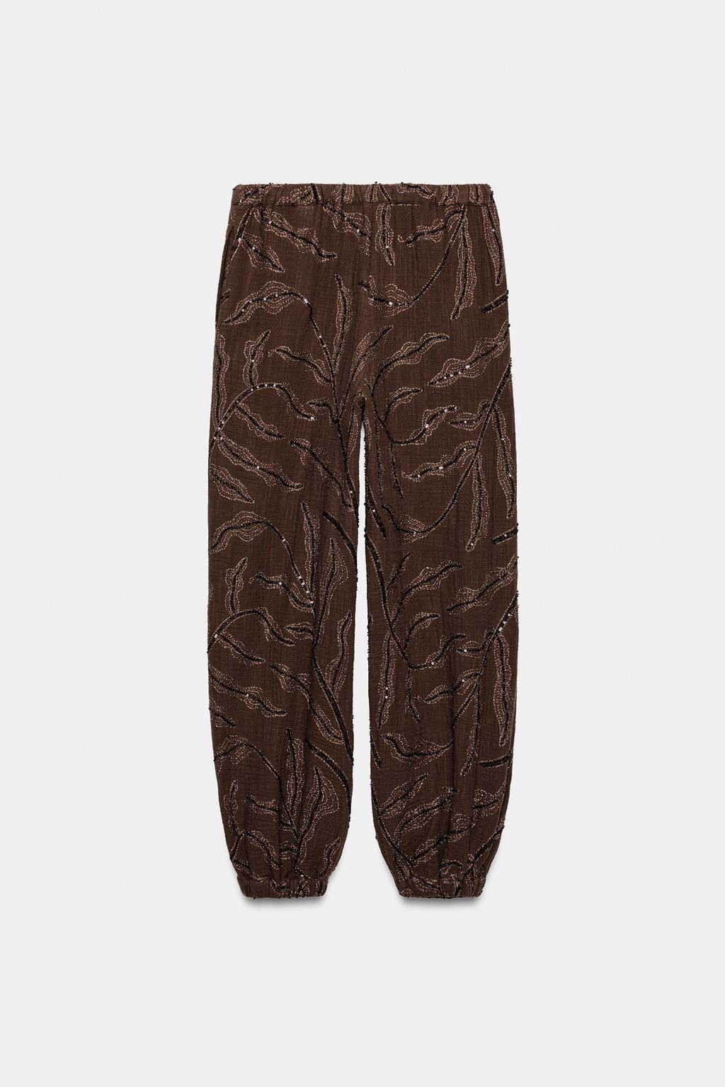 ШАРОВАРЫ ИЗ МЕТАЛЛИЗИРОВАННОЙ ТКАНИ С ПАЙЕТКАМИ