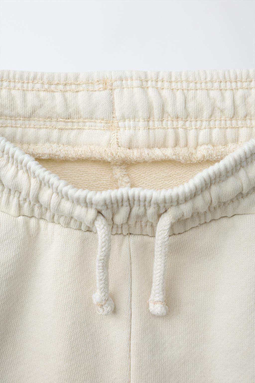 ШОРТЫ ИЗ МЯГКОЙ ТКАНИ С ОКРАШИВАНИЕМ И ВЫШИВКОЙ