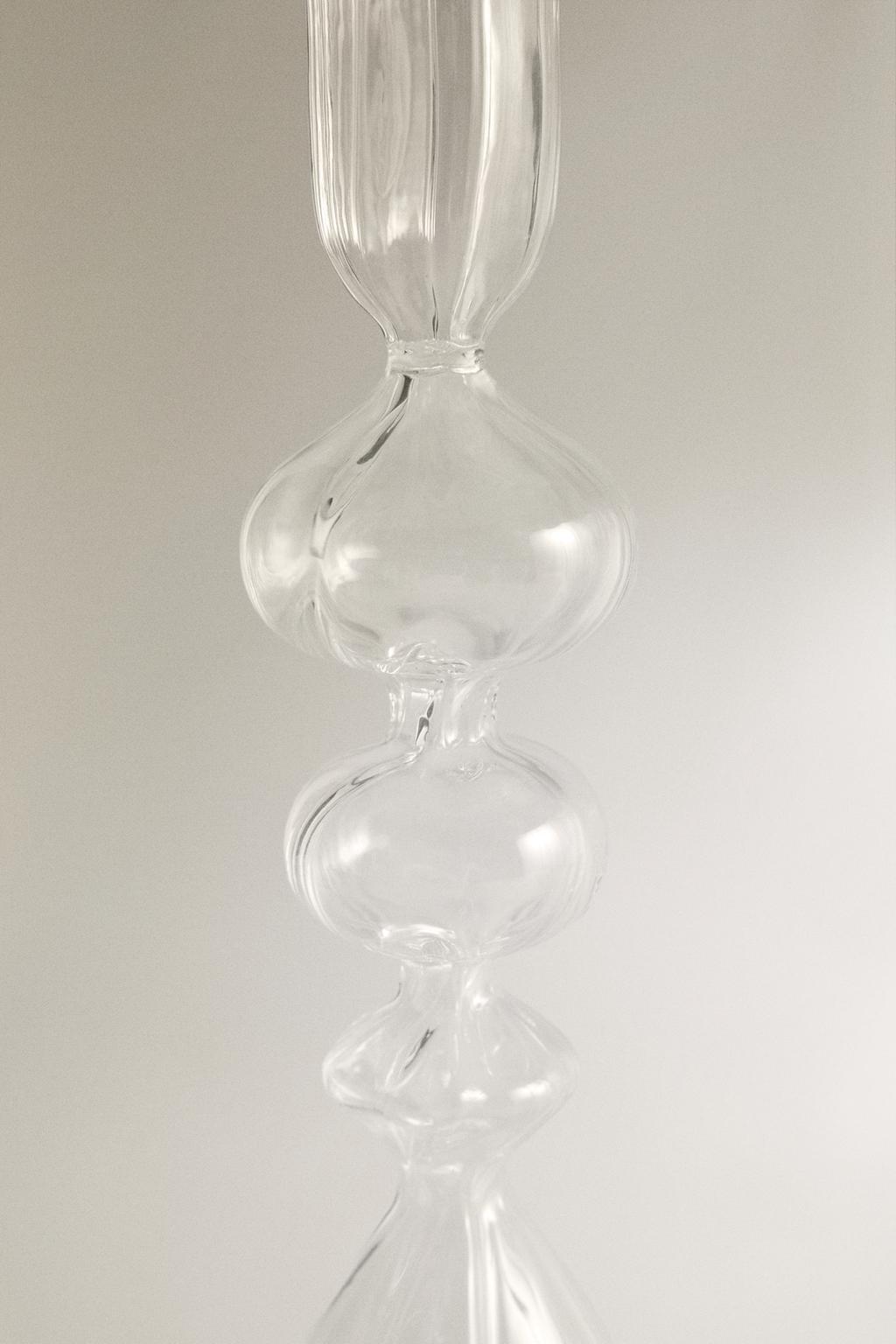 Прозрачный стеклянный подсвечник