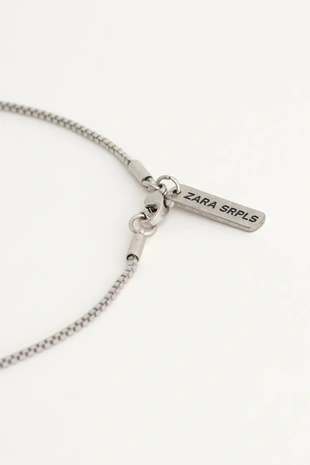 Ожерелье из нержавеющей стали с металлическими звеньями и контрастными подвесками- Заказать в России