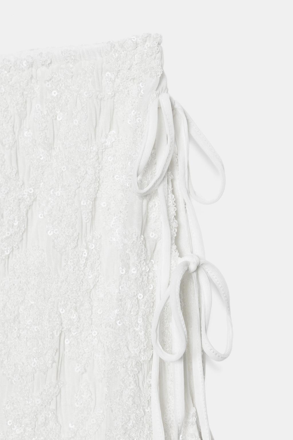 МИНИ-ЮБКА С ПАЙЕТКАМИ И ЗАВЯЗКАМИ