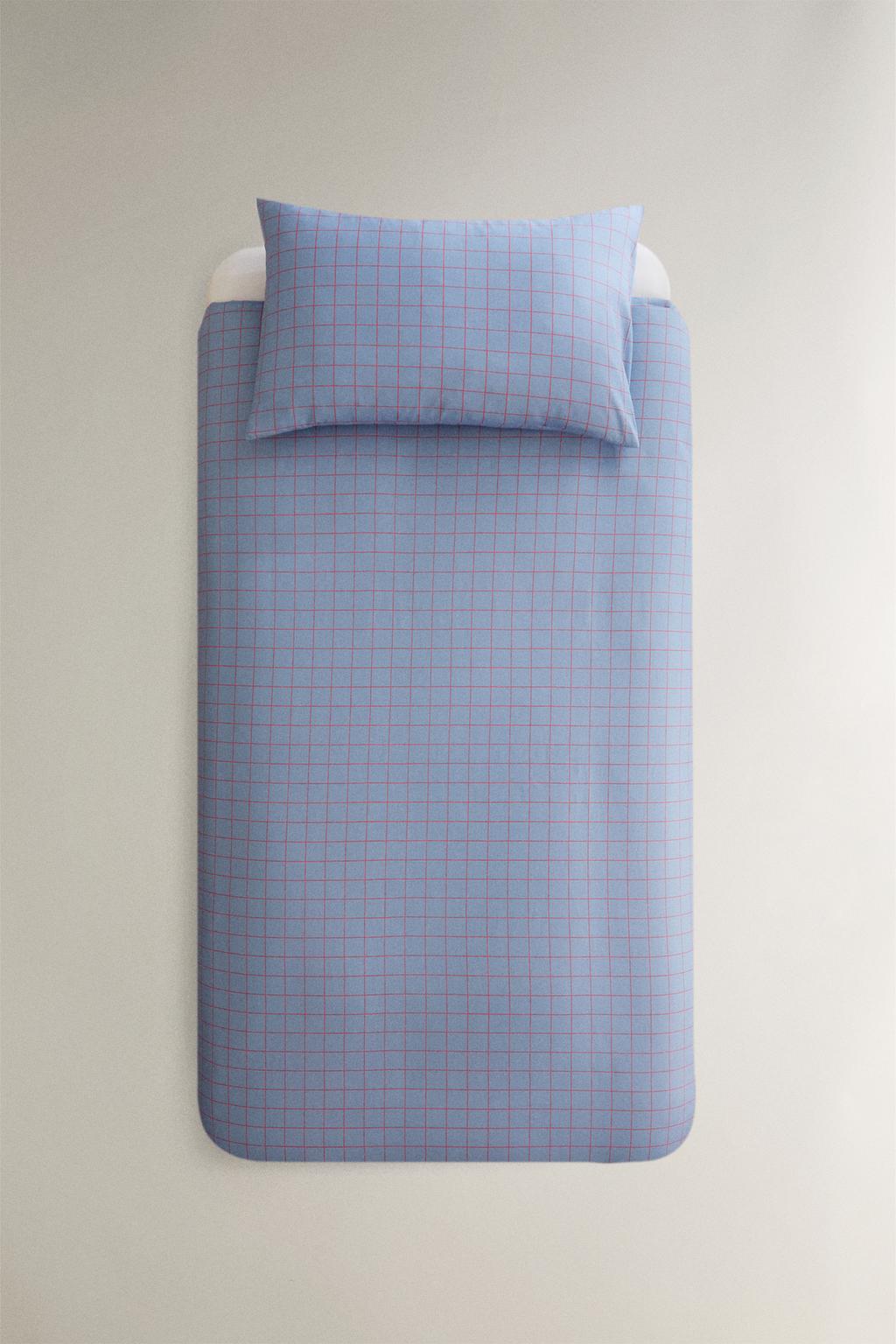 Детское одеяло с клетчатым узором