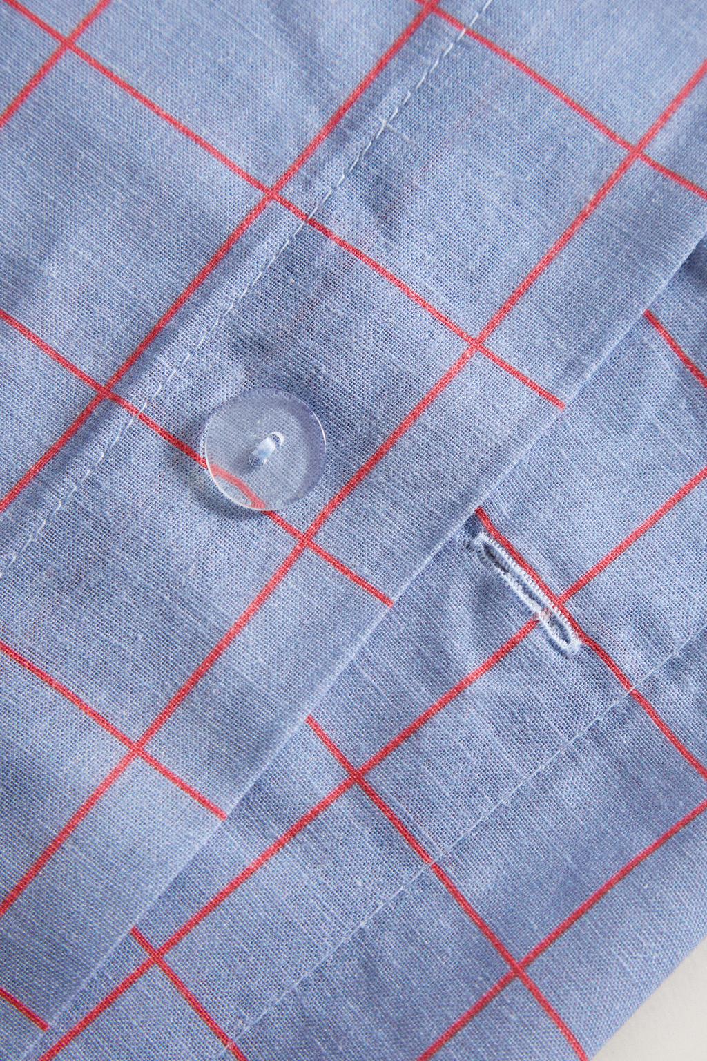 Детское одеяло с клетчатым узором