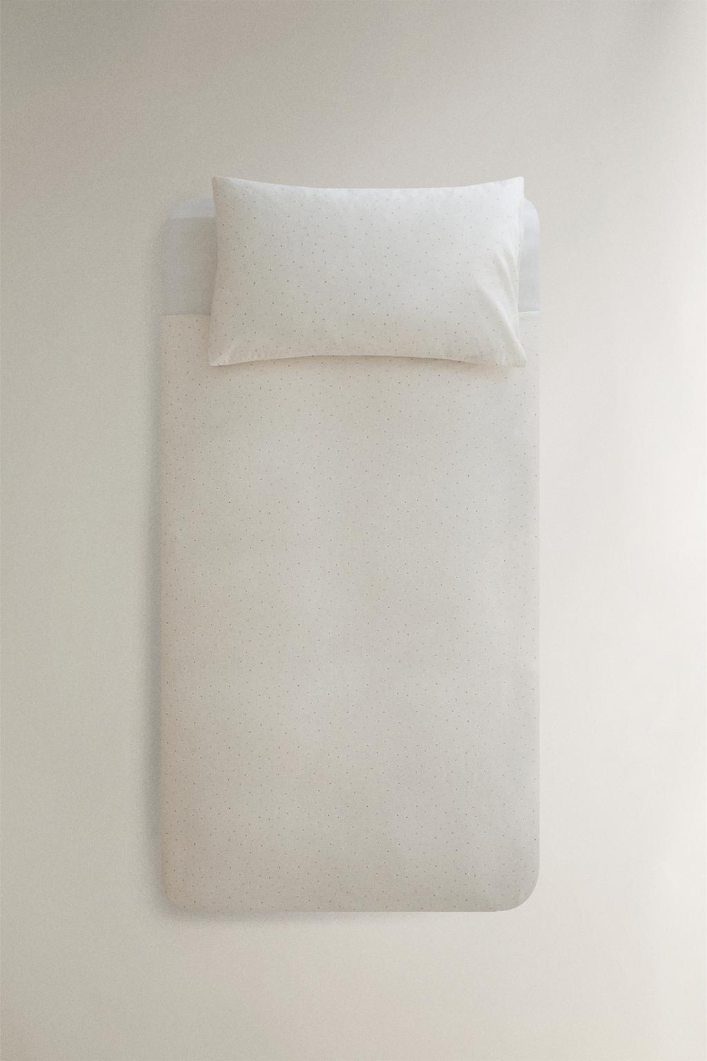 Детское постельное одеяло в горошек