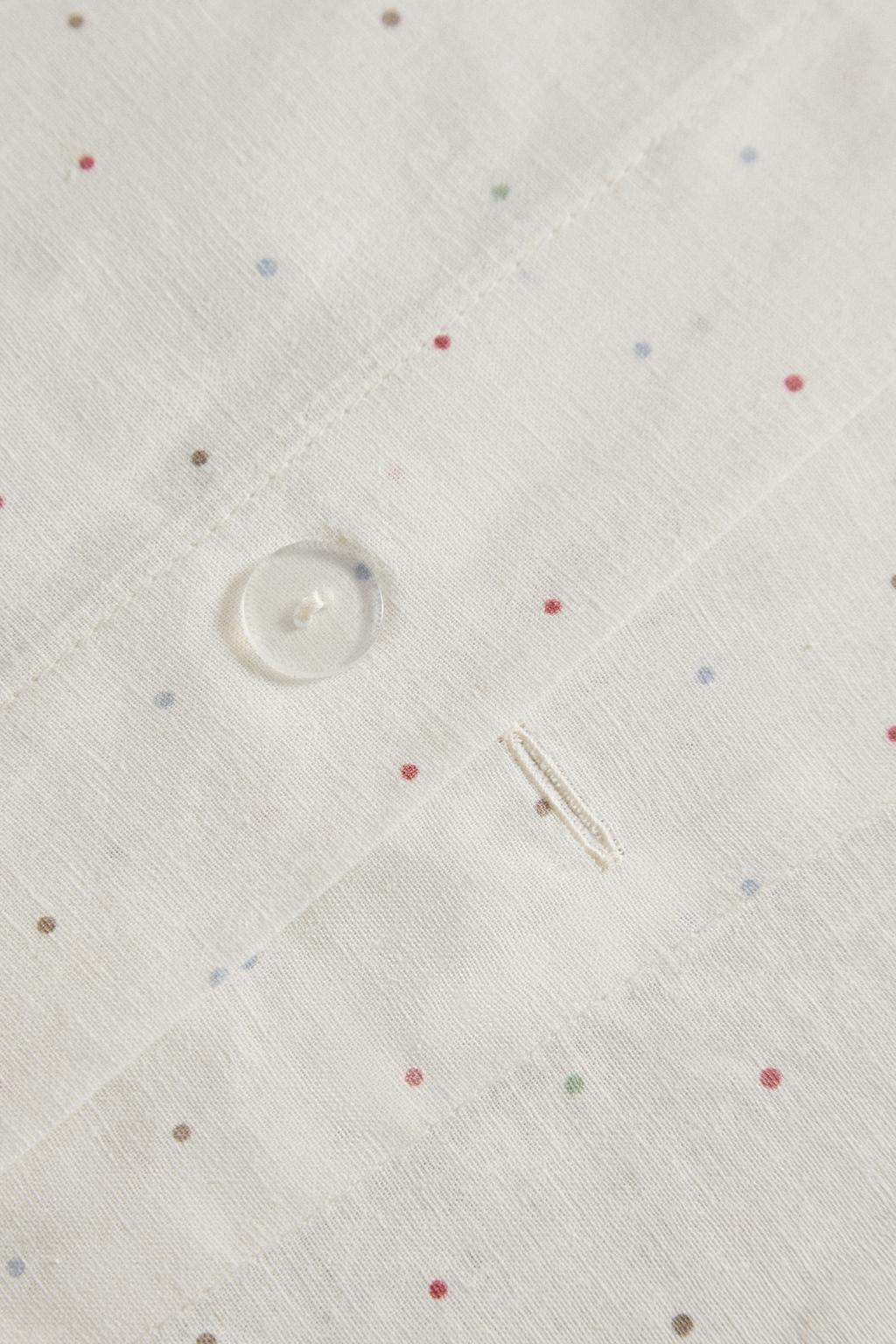 Детское постельное одеяло в горошек