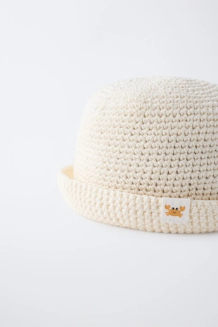 Шапка кроше с нашивкой- Заказать в России