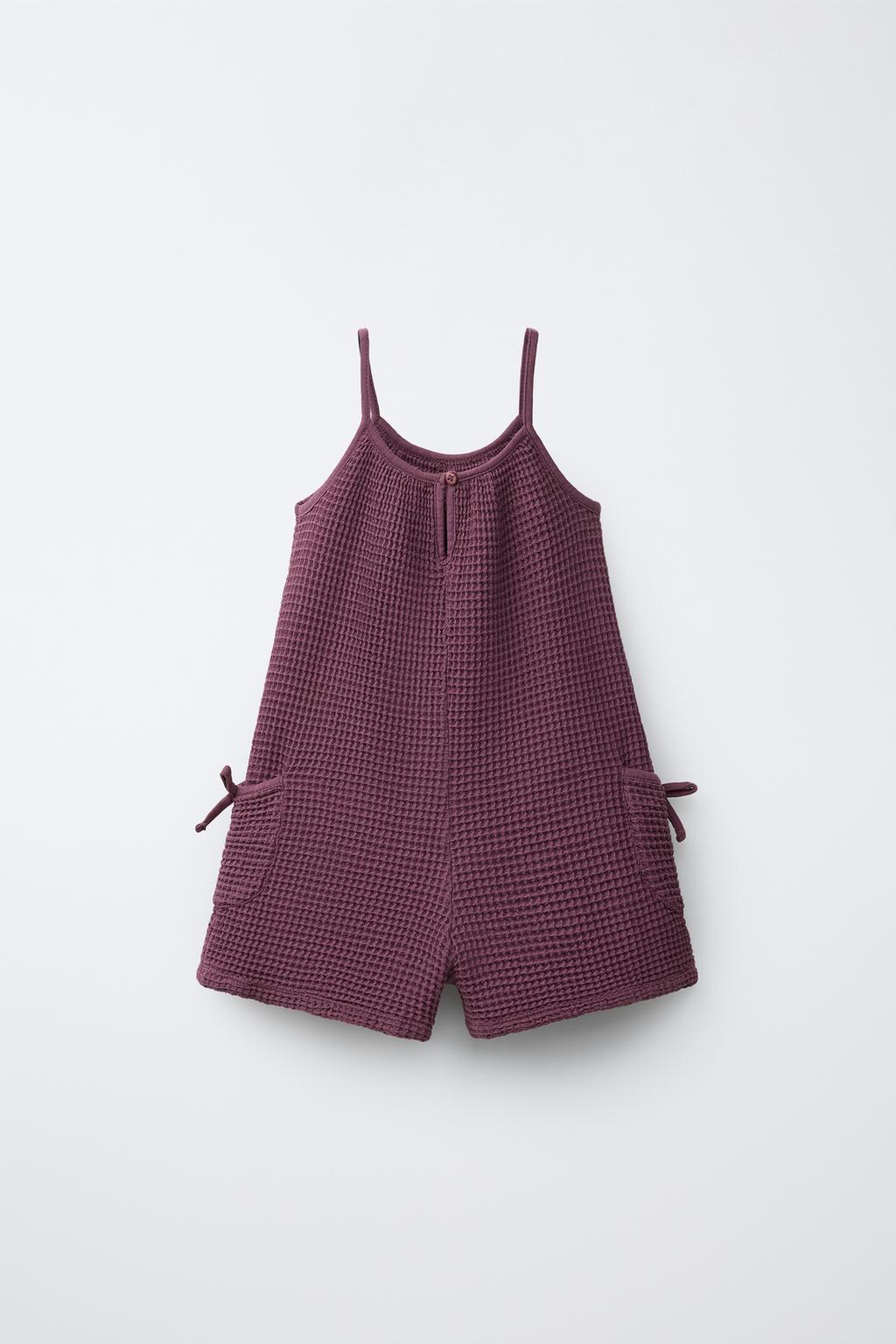 КОРОТКИЙ КОМБИНЕЗОН ИЗ РИФЛЕНОЙ ТКАНИ С БАНТАМИ