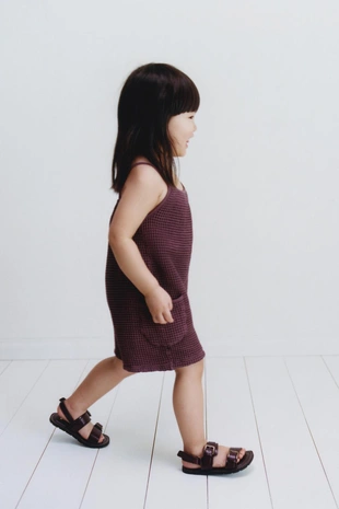 Короткий комбинезон из рифленой ткани с бантами- Заказать в России