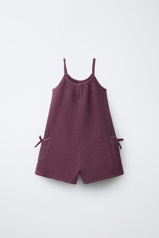 Короткий комбинезон из рифленой ткани с бантами- Заказать в России