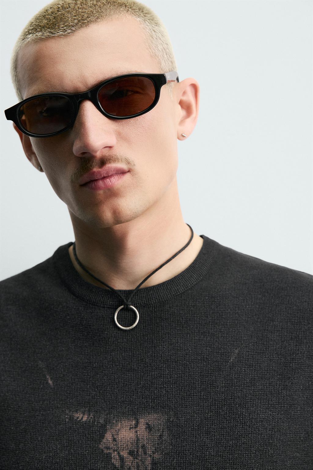 ТРИКОТАЖНЫЙ ТОП БЕЗ РУКАВОВ С ПРИНТОМ